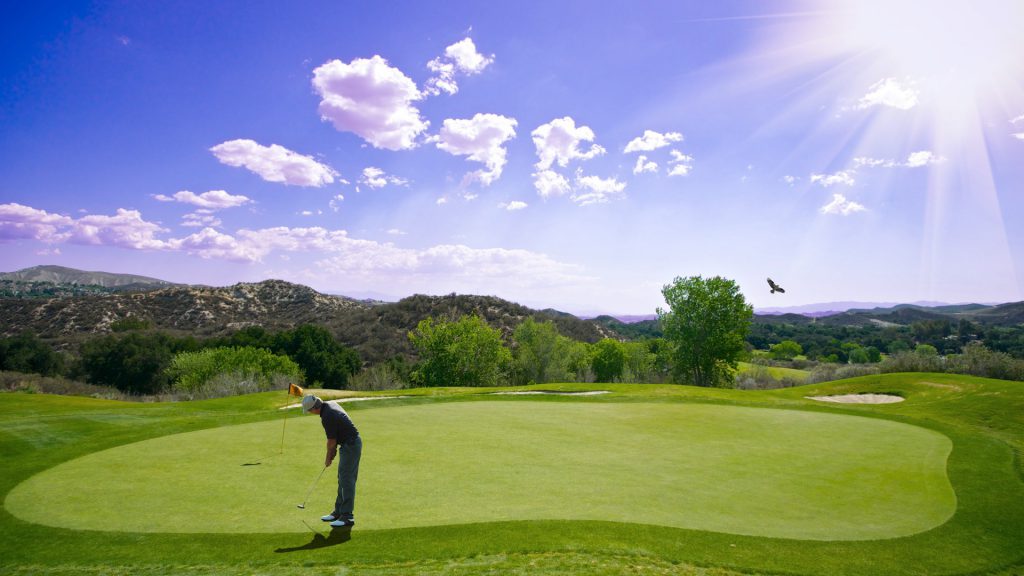 golfer and a range shot